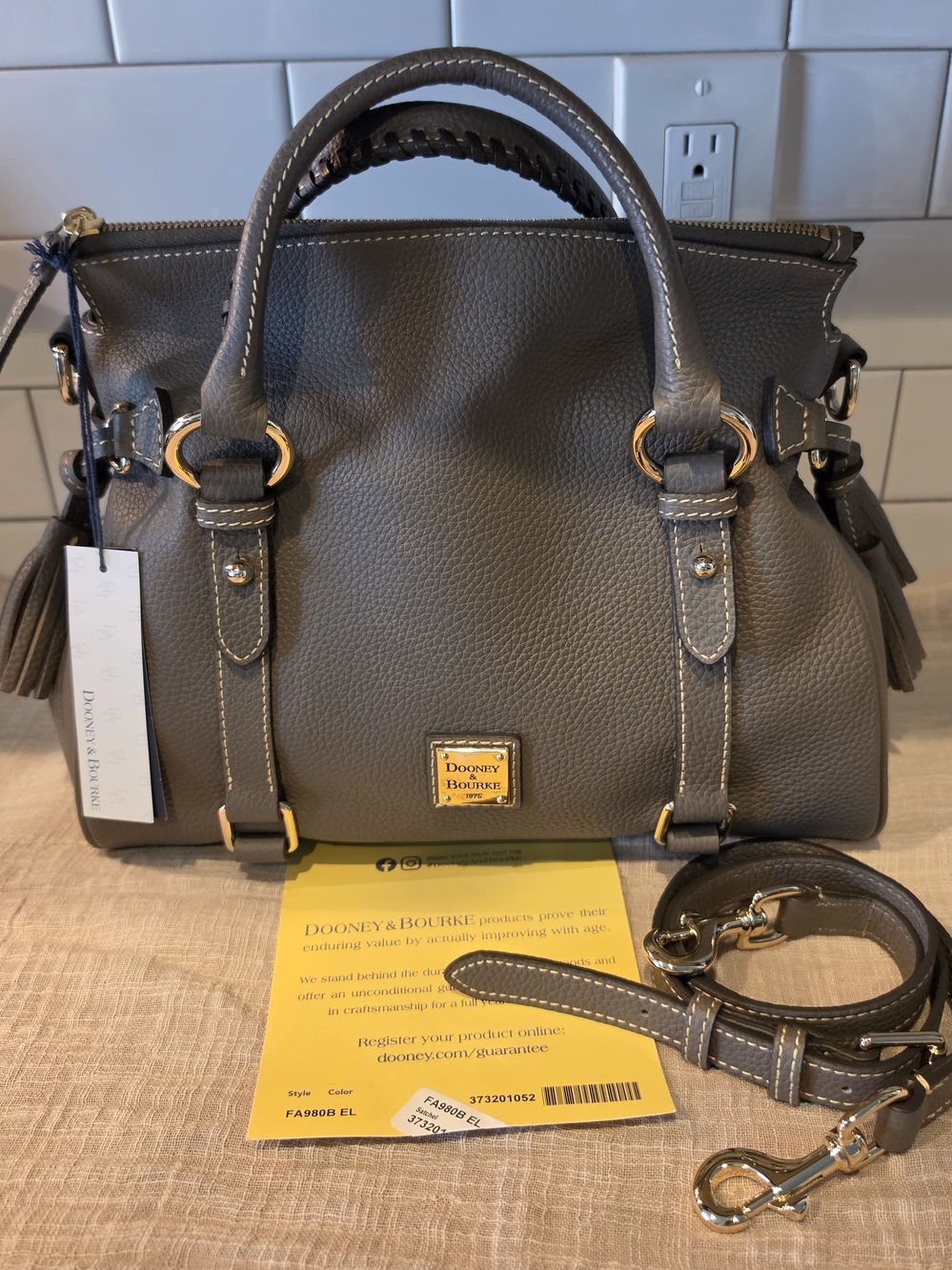 The Dooney & Bourke Pebble Grain Grey Pebble Leather Satchel